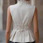 Sleeveless High-Neck Flared Hem Tailored Blouse