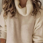 High-neck button-decorated loose knit sweater