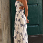 Margovil Spaghetti Strap Cut Out Waist Printed Midi Dress