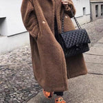 Long oversized coat with faux teddy bear fur