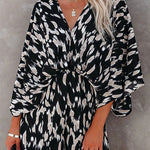 Margovil V Neck Batwing Sleeve Printed Romper