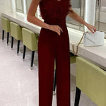Margovil Off Shoulder Feather Splice Belted Jumpsuit