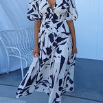 Margovil V Neck Puff Sleeves Printed Maxi Flowy Dress