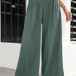 Cotton and linen distressed mid-rise wide-leg trousers