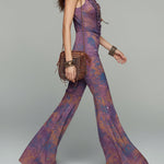 Retro-print Jumpsuit With Ruffled Neckline And Flared Legs