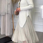 Jensine Ribbed Knit Long Sleeve Irregular Hem Loose Sweater