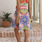 Margovil Sleeveless Back Criss Cross Bow Waist Sun Print Mini Dress
