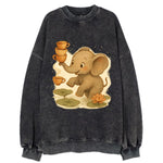 Elephant balancing teacups during a floating tea ceremony beside lotus ponds - Vintage Sweatshirt