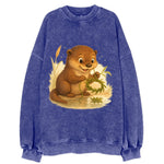 Otter weaving river reeds into a floating crown beside mirror-still water - Vintage Sweatshirt