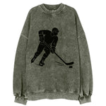 Ice hockey player shooting puck - Vintage Sweatshirt