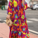 Pink babydoll dress with daisy print