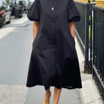 A-Line Loose Pleated Pockets Solid Color Round-Neck Midi Dresses