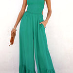 Solid color halter neck open back flared jumpsuit