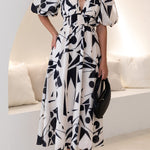 Elegant V-neck slim waist large swing skirt printed dress