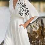 Half Sleeves High Waisted Flower Print Pleated Pockets Deep V-Neck Jumpsuits