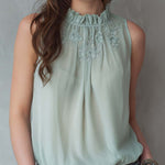 Elegant Embroidered High-Neck Sleeveless Blouse