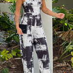 BLACK AND WHITE PRINTED JUMPSUIT WITH CRISS CROSS BACK