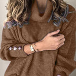 High-neck button-decorated loose knit sweater