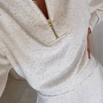 Half-zip sweatshirt and cropped pants set