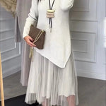 Jensine Ribbed Knit Long Sleeve Irregular Hem Loose Sweater