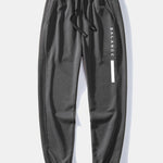 Balance Stripe Print Jogging Pants