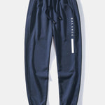 Balance Stripe Print Jogging Pants